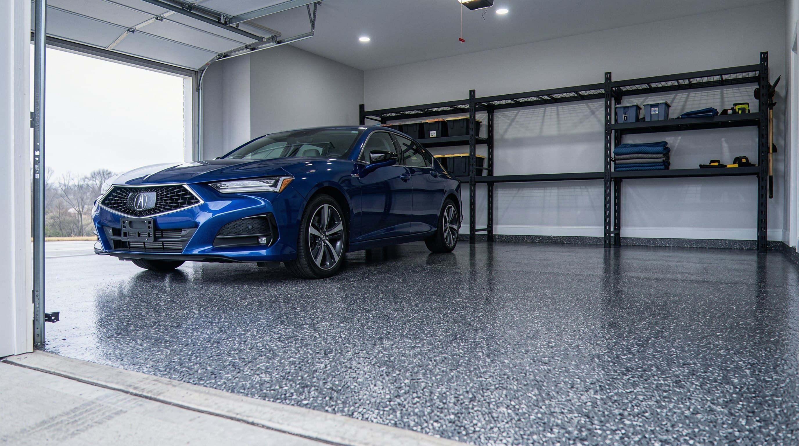 Huntsville garage floor finished in grey flake epoxy